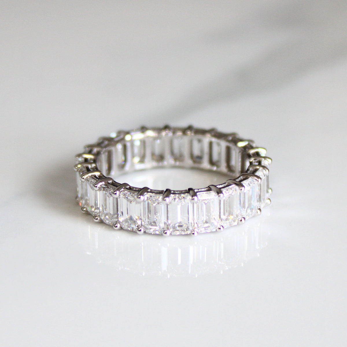 14kt Gold 7.3 Carat VS Emerald Cut Lab Diamond Eternity Ring