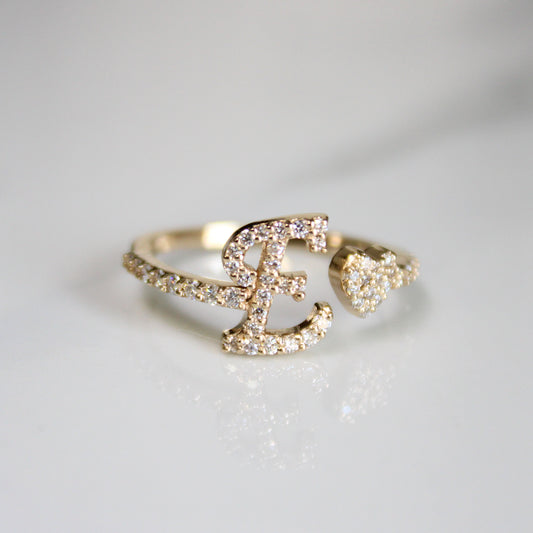 14kt gold and diamond letter E ring